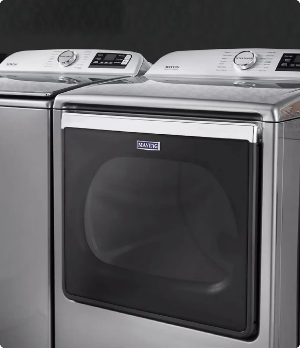 Maytag Bravos top-load washer with agitator removed for service