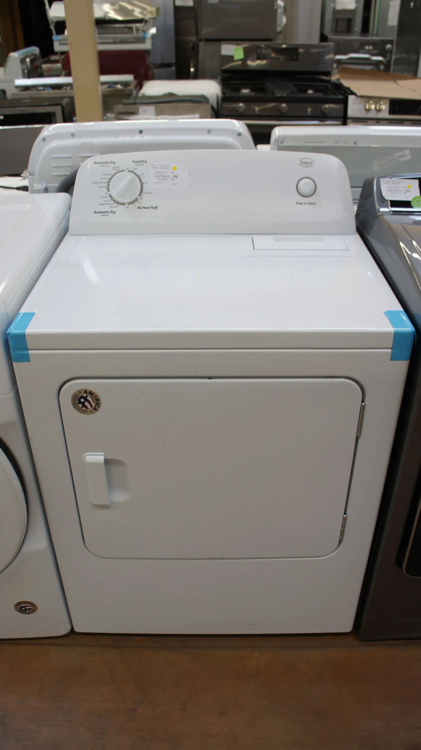 Roper dryer service panel showing internal belt and drum components